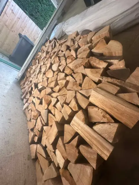 Firewood stacked at a customer's home in Dorset